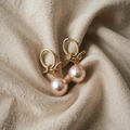 Coliere elegante cu perle roz
