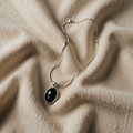 Colier oval negru elegant din aur alb